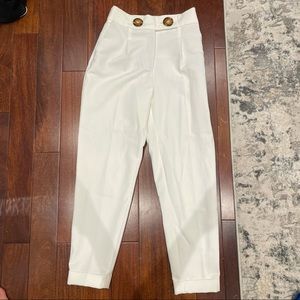 white dress pants with tortoise shell buttons